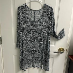 Black and white tunic. Longer in the back.